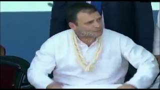 Woman kisses Congress President Rahul Gandhi during a rally in Valsad