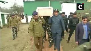 Rajnath and J&K DGP Dilbagh Singh lend a shoulder to mortal remains of a CRPF soldier in Budgam
