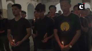 Tibetan students hold candlelight prayer in Vadodara for slain CRPF personnel