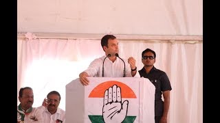 Congress President Rahul Gandhi addresses a public meeting in Dhule, Maharashtra