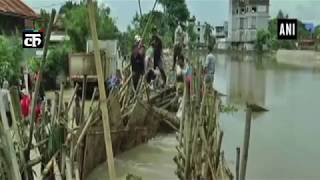 बाढ़ के तहत पूर्वोत्तर रीलों, बीएसएफ बचाव अभियान शुरू