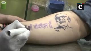 #MainBhiChowkidaar gains momentum, BJP workers get tattoos to support campaign
