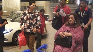 Karan Johar Spotted With Mother Hiroo Johar At Mumbai Airport