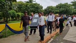 Funeral procession in honour of Nilesh Cabral and the failing CZMP draft plan hearings at Margao