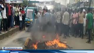 Patan: ગેરકાયદે દબાણ હટાવતાં હોબાળો, વેપારીઓએ રોડ પર ટાયરો સળગાવી કર્યો વિરોધ