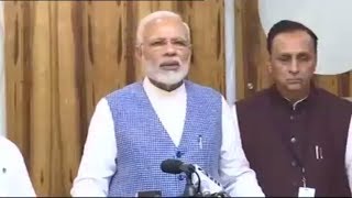 PM Modi addresses the media after reviewing the situation of flood affected areas, in Gujarat | PMO