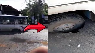Bus Tyre Sinks Into Hole Due To Bad Road At Baga
