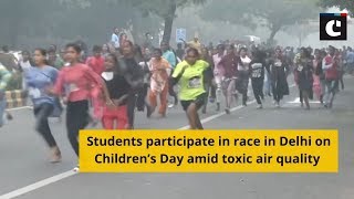 Students participate in race in Delhi on Children’s Day amid toxic air quality