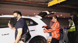 Govinda Along With His Wife Spotted At Mumbai Airport