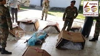 Army apologize for using card board boxes to carry dead bodies