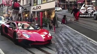 Guy Runs Over Lamborghini Aventador SV - Gets Knocked Out