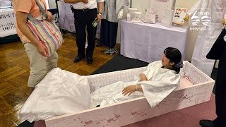 This weird festival in Japan is all about teaching people how to die properly