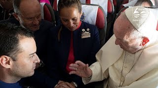 Pope performs first marriage on board a papal flight