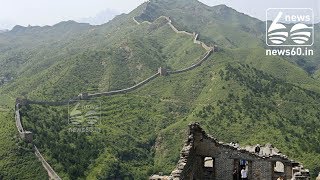 China's Xinjiang to build 'Great Wall' to protect border: governor