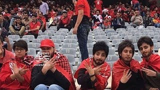 Iranian women sneak into soccer game dressed as men