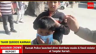 Karnah Police launched drive distribute masks & fined violator at Tangdar Karnah.