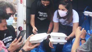 Sunny Leone & Husband Daniel Weber Distributing Food To The Poor In Bandra East