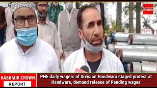 PHE daily wagers of Division Handwara staged protest at Handwara, demand release of Pending wages