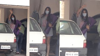 Rhea Chakraborty waves at paparazzi as she spotted after long time