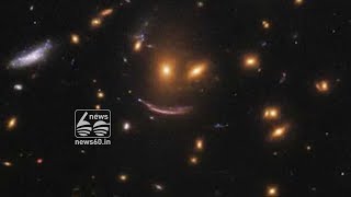 behind the smiling face in space