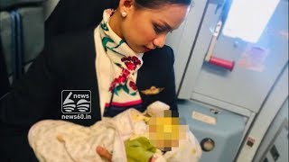 Air hostess breast feeds passenger's daughter