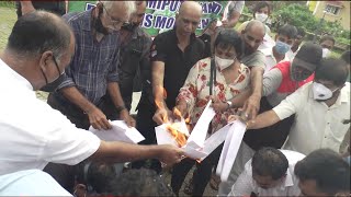 Bhumiputra Adhikarni Bill- Claude Alvares along with other environmentalist burn copies of the bill