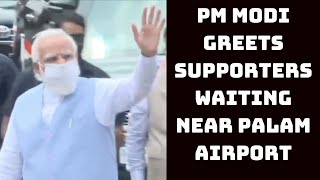 Watch: PM Modi Greets Supporters Waiting Near Palam Airport | Catch News