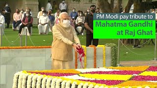 PM Modi pay tribute at the Samadhi of Mahatma Gandhi at Raj Ghat in Delhi | PMO