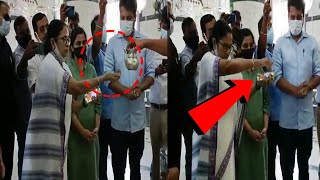 #WATCH | Mamata Banerjee throws tirth on ground at Mangueshi temple!