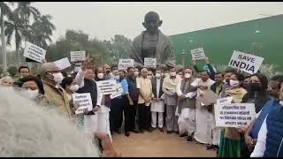 Shri Rahul Gandhi & other opposition party MPs protesting at Gandhi statue in Parliament House