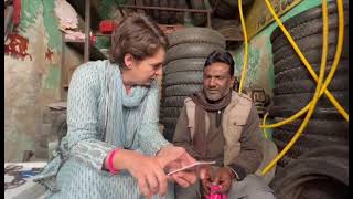 Smt. Priyanka Gandhi interacts with a shop-keeper