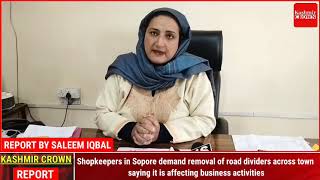 Shopkeepers in Sopore demand removal of road dividers across town, saying it is affecting business