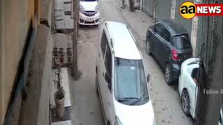 CCTV Car theft, Budh Vihar Delhi टोचन कर ले गए कार #aa_news @AA News