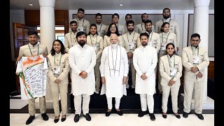PM Shri Narendra Modi hosts Indian Deaflympics contingent at his residence.