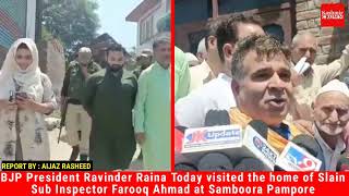 BJP President Ravinder Raina  visited today the home of Slain SI  Farooq Ahmed at Samboora Pampore