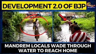 This is Development 2.0 of BJP. Mandrem locals wade through water to reach home