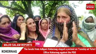 The locals from Adigam Kokernag staged a protest on Tuesday at Tehsil Office Kokernag against  PDD