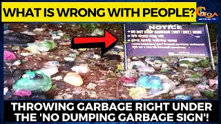What is wrong with people? Throwing garbage right under the 'No Dumping Garbage sign'!