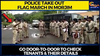 Police take out flag march in Morjim. Go door-to-door to check tenants & their details