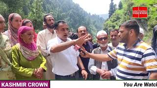 Shafiq mir  BDC chairman bufliaz visit dogra village and meet flood victims.