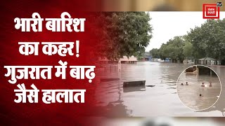 Gujarat: भारी बारिश के बाद Surat के निचले इलाकों में बाढ़ जैसे हालात, देखें Video