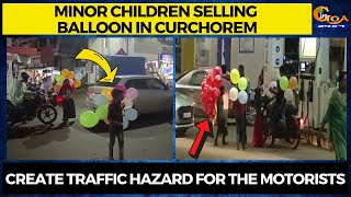 Minor children selling balloon in Curchorem. Create traffic hazard for the motorists