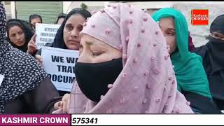Pakistani wives of ex-militants staged a protest, seeking issuance of travel documents to travel