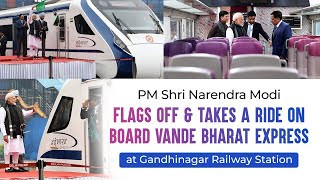 PM Modi flags off & takes a ride on board Vande Bharat Express at Gandhinagar Railway Station.