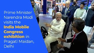Prime Minister Narendra Modi visits the India Mobile Congress exhibition in Pragati Maidan, Delhi l