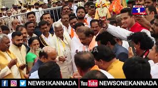 CM ಬೊಮ್ಮಾಯಿ ದಂಪತಿಯಿಂದ ನಂದಿ ಧ್ವಜಕ್ಕೆ ಪೂಜೆ | Mysuru | News 1 Kannada | cmbommai | nandidwaja | pooja