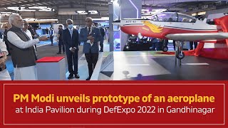 PM Modi unveils prototype of an aeroplane at India Pavilion during DefExpo 2022 in Gandhinagar