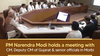 PM Narendra Modi holds a meeting with CM, Deputy CM of Gujarat & senior officials  in Morbi