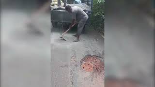 Electricity dept workers seen doing road patch work, which should have been done by the PWD