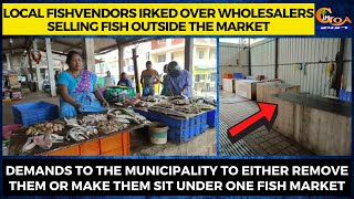 Local fishvendors irked over wholesalers selling fish outside the market.